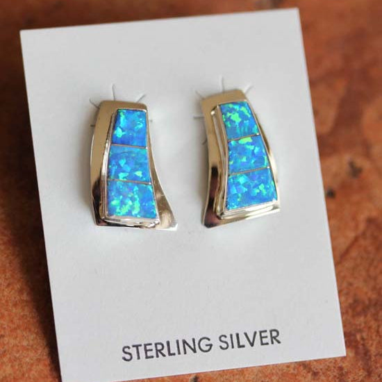 Rectangular silver earrings with a blue opal gemstone