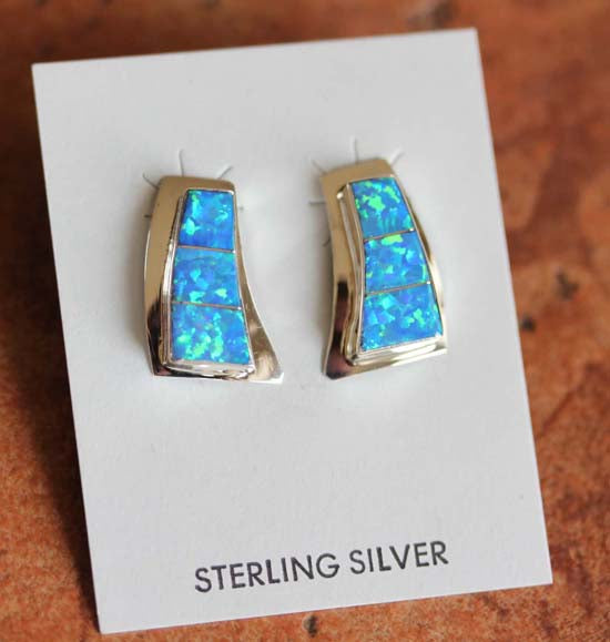 Rectangular silver earrings with a blue opal gemstone