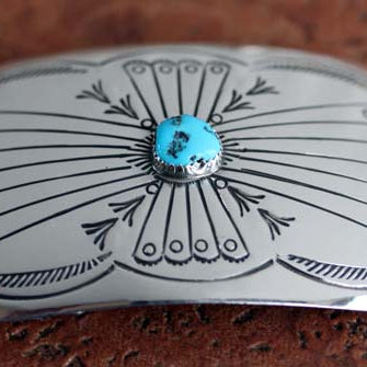 Rectangular Belt Buckle with a circular turquoise gem stone in the center