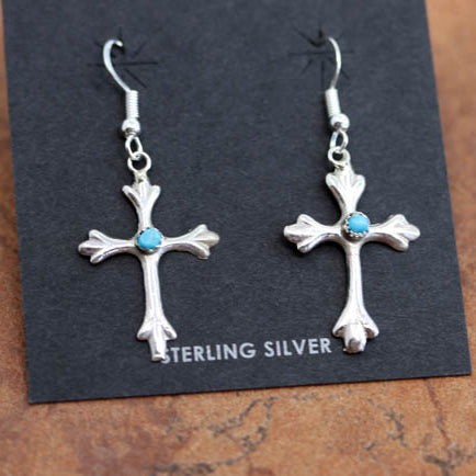 Beautiful Navajo Native American earrings. They are made from sterling silver and turquoise. The earrings are about 1 7/8" in length including the hook and 7/8" wide.