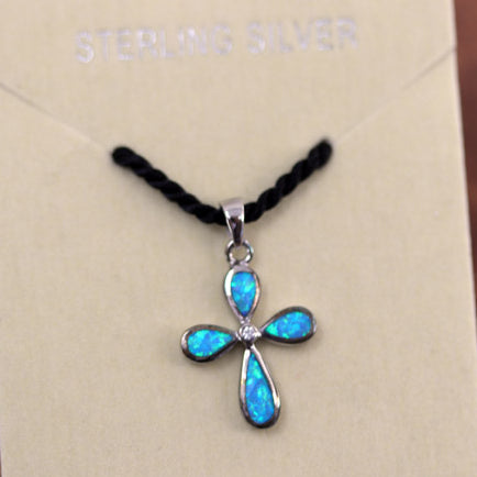 A lovely cross pendant is 1 1/8" in length and 5/8" in width. The 18" rope is included.