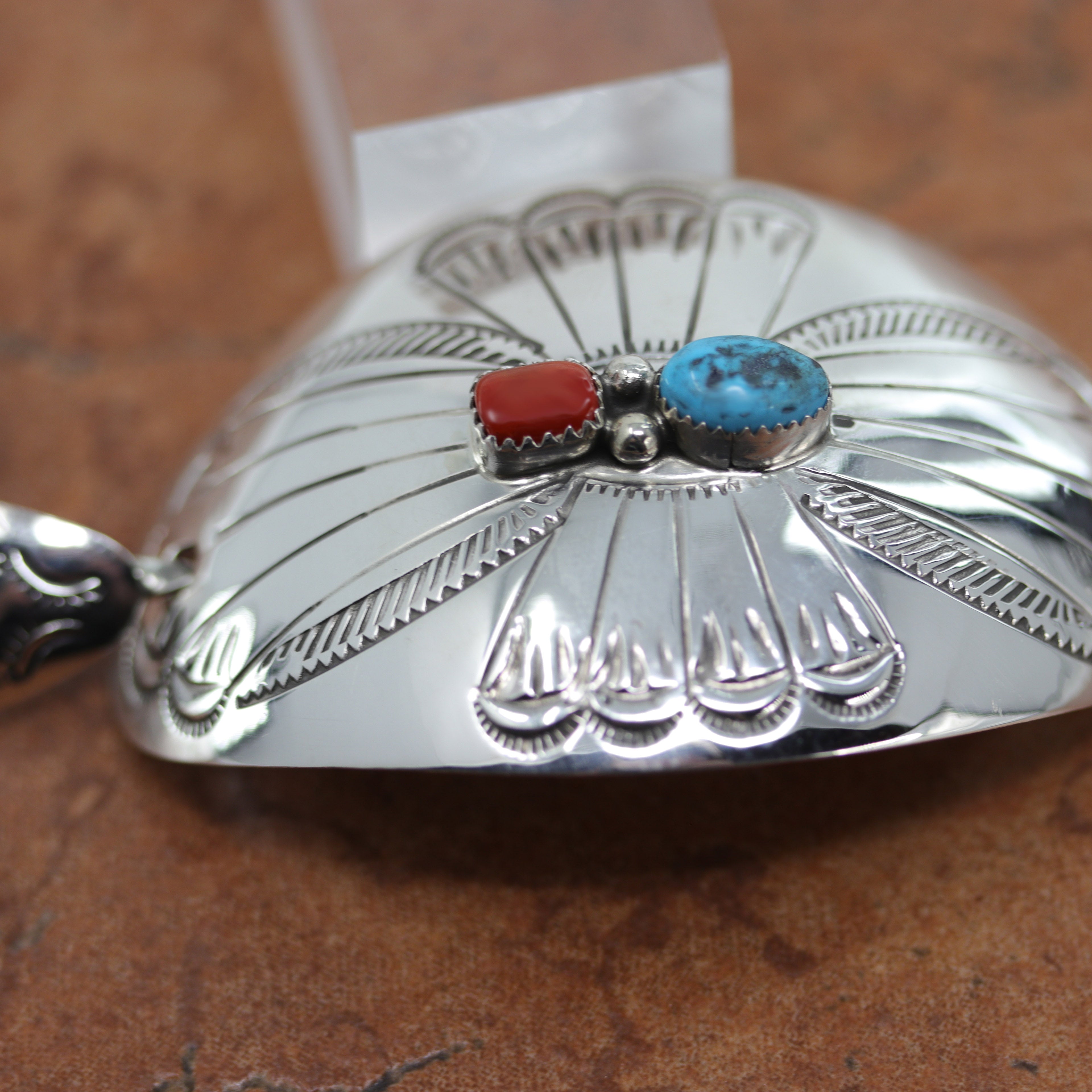 Lovely Navajo Native American Barrette made from sterling silver, turquoise, and coral. It is 1 3/4" long, and about 2 3/4" wide. The pin measures 3 3/4" in length.
