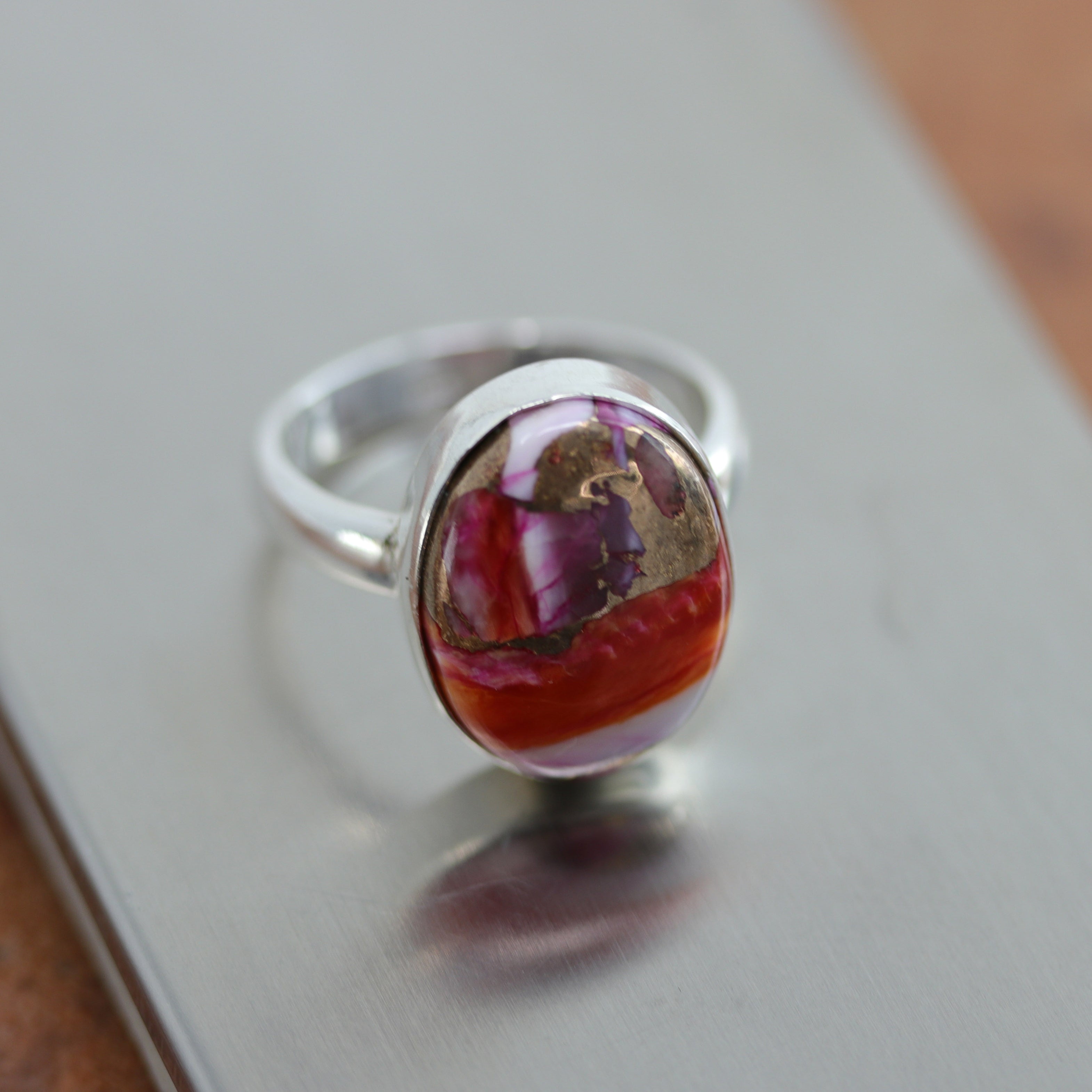 A beautiful Southwest Style gemstone ring made from sterling silver and mojave turquoise. The ring size is 6 1/2 and it is 3/4" in length.