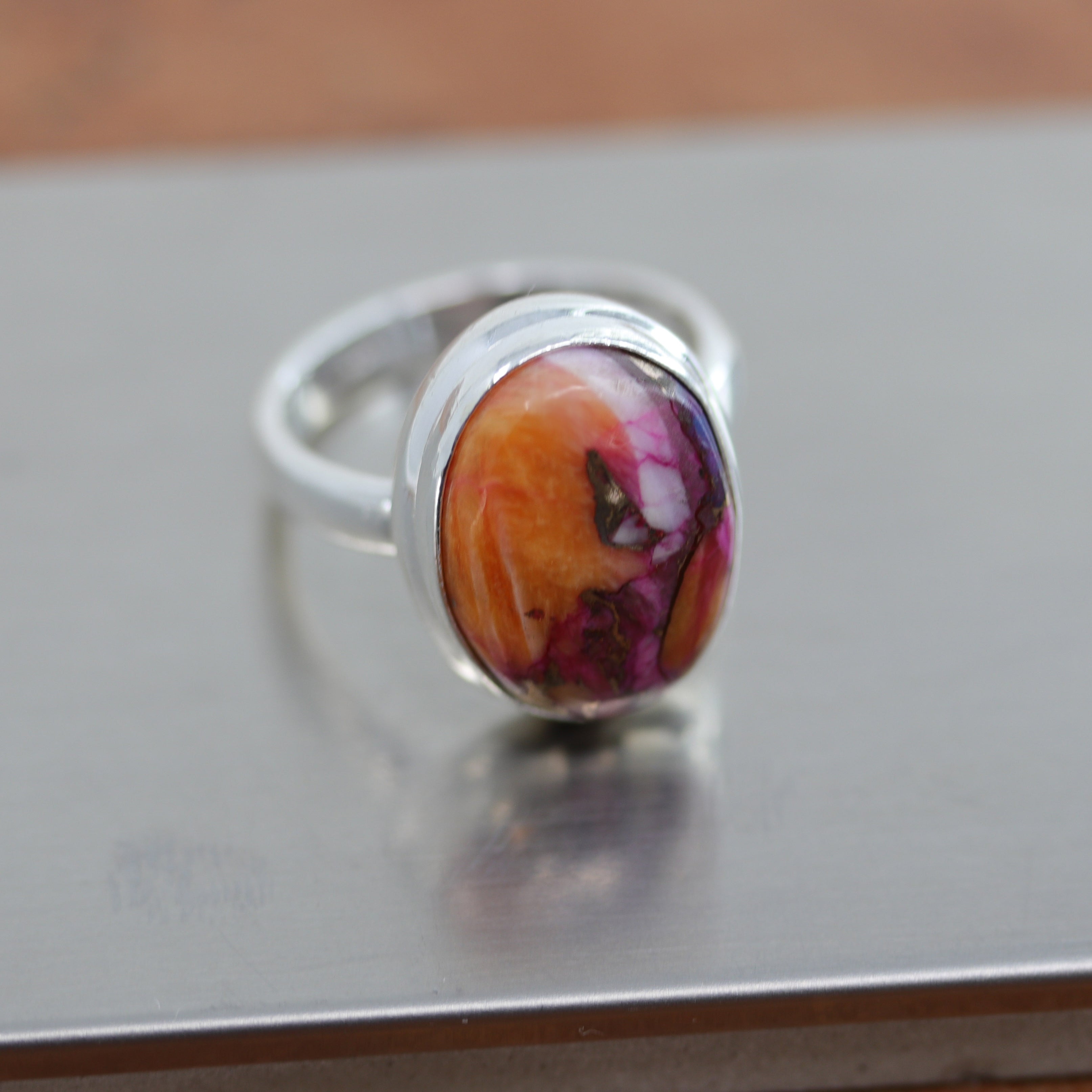 A beautiful Southwest Style gemstone ring made from sterling silver and mojave turquoise. The ring size is 6 1/2 and it is 3/4" in length.