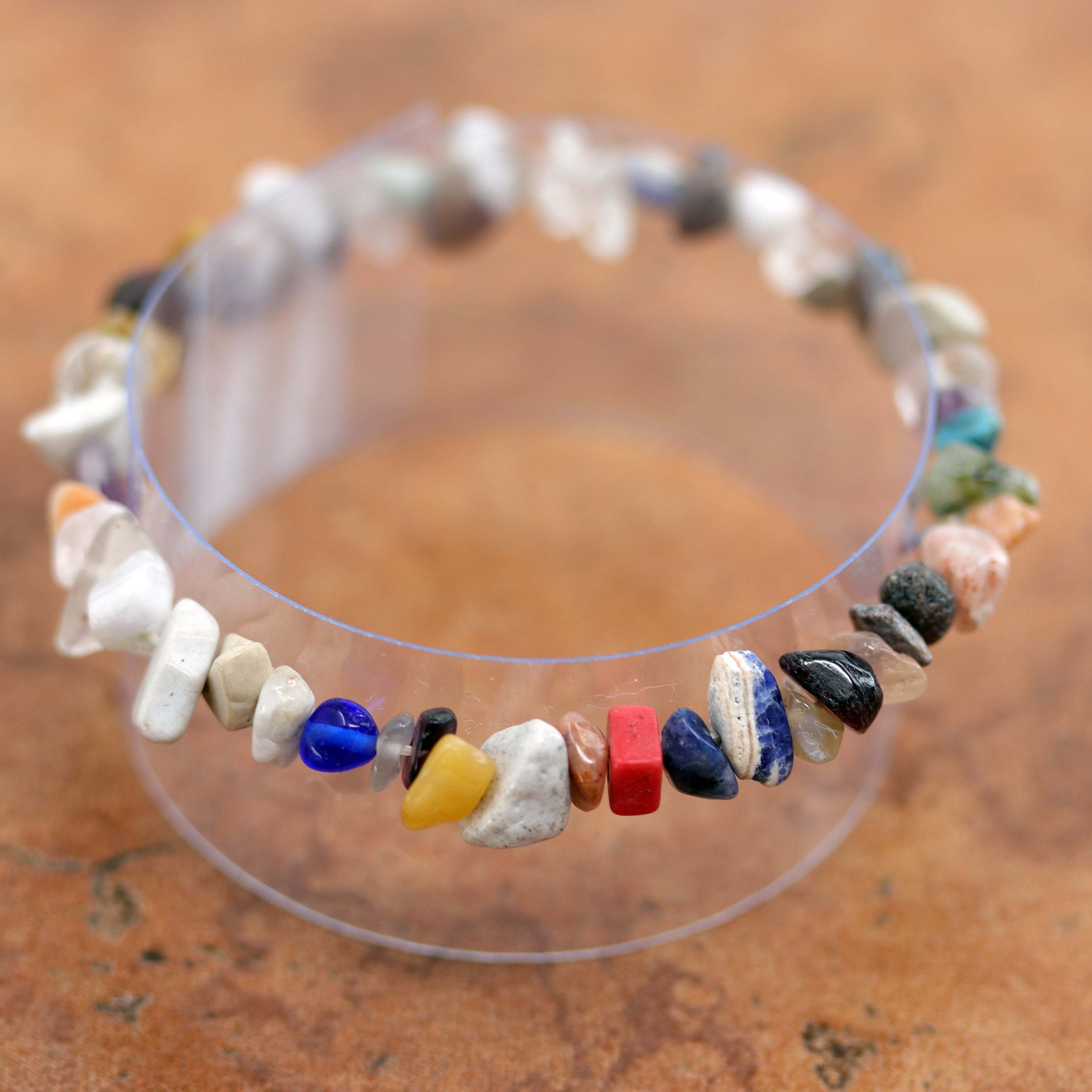 A beautiful bracelet with different stones and nuggets. It fits sizes 6" (more loose) to about 7" (tighter fit). The width is 1/2".