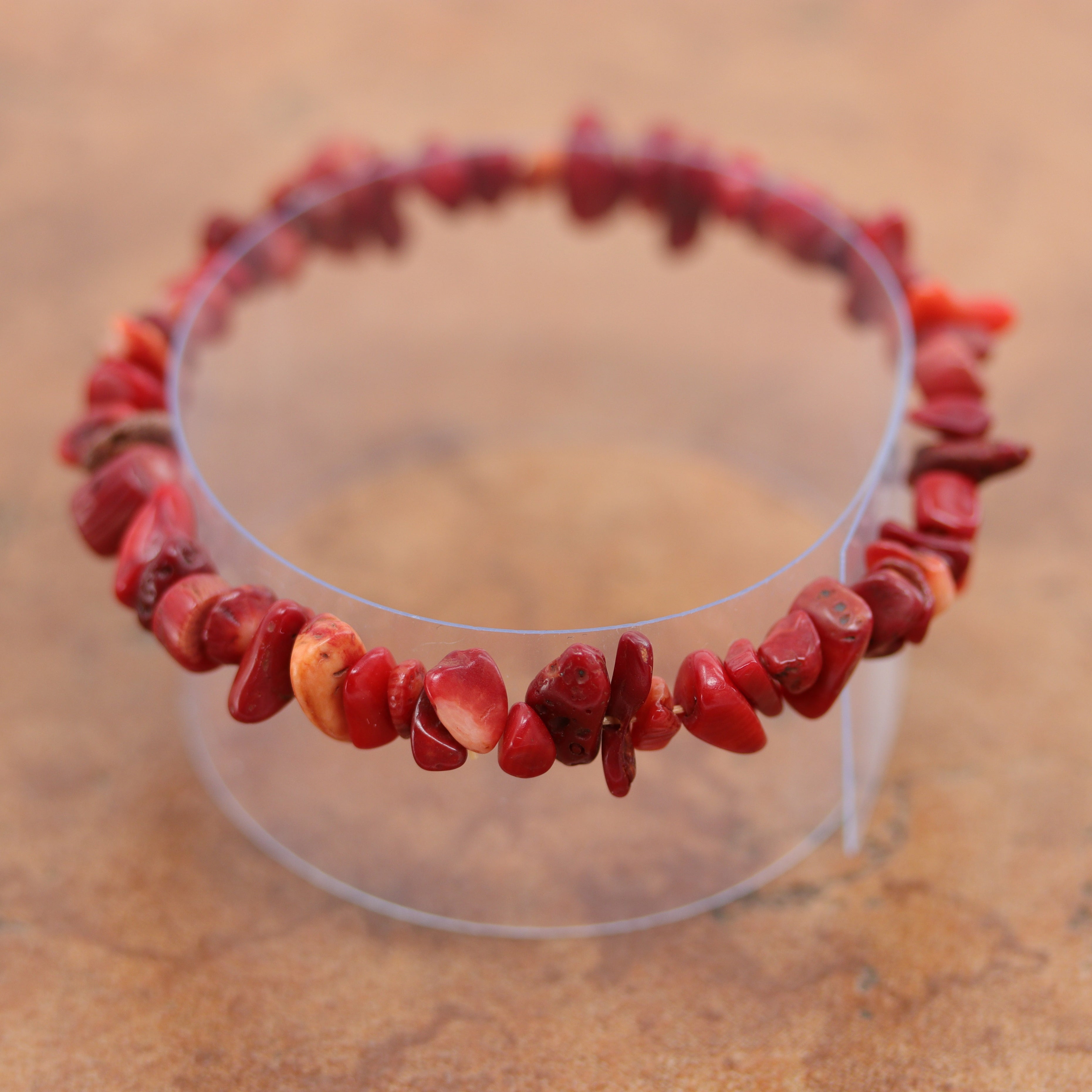 Unique bamboo coral chip bracelet that fits sizes 6" (more loose) to about 9" (tighter fit). The width of the bracelet is 1/2".