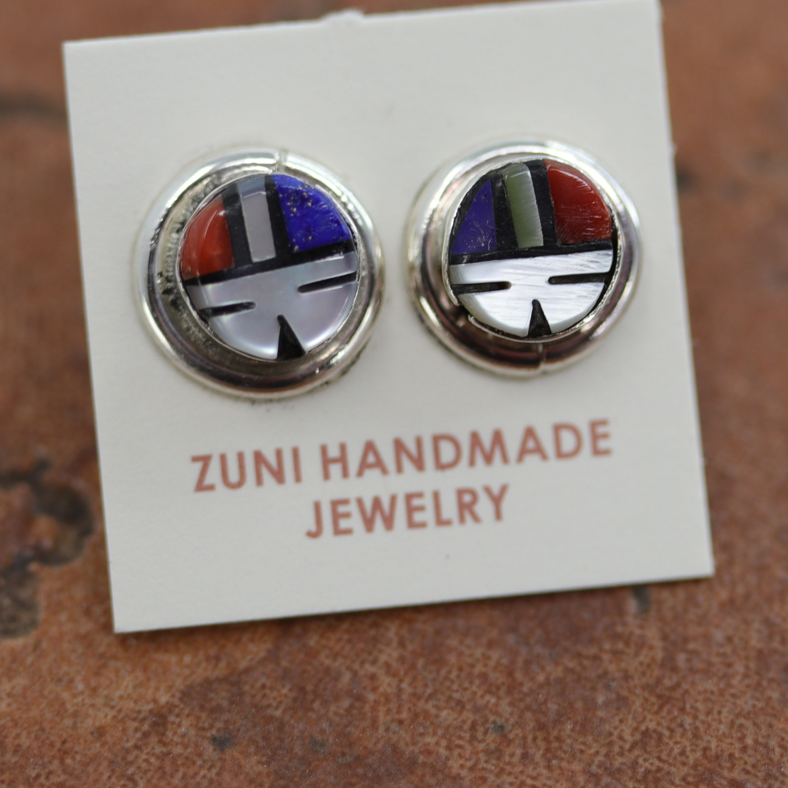 Brand new, very nice, Zuni Native American earrings. They are made from sterling silver and multi-stone inlay. The earrings are about 7/16" in diameter.