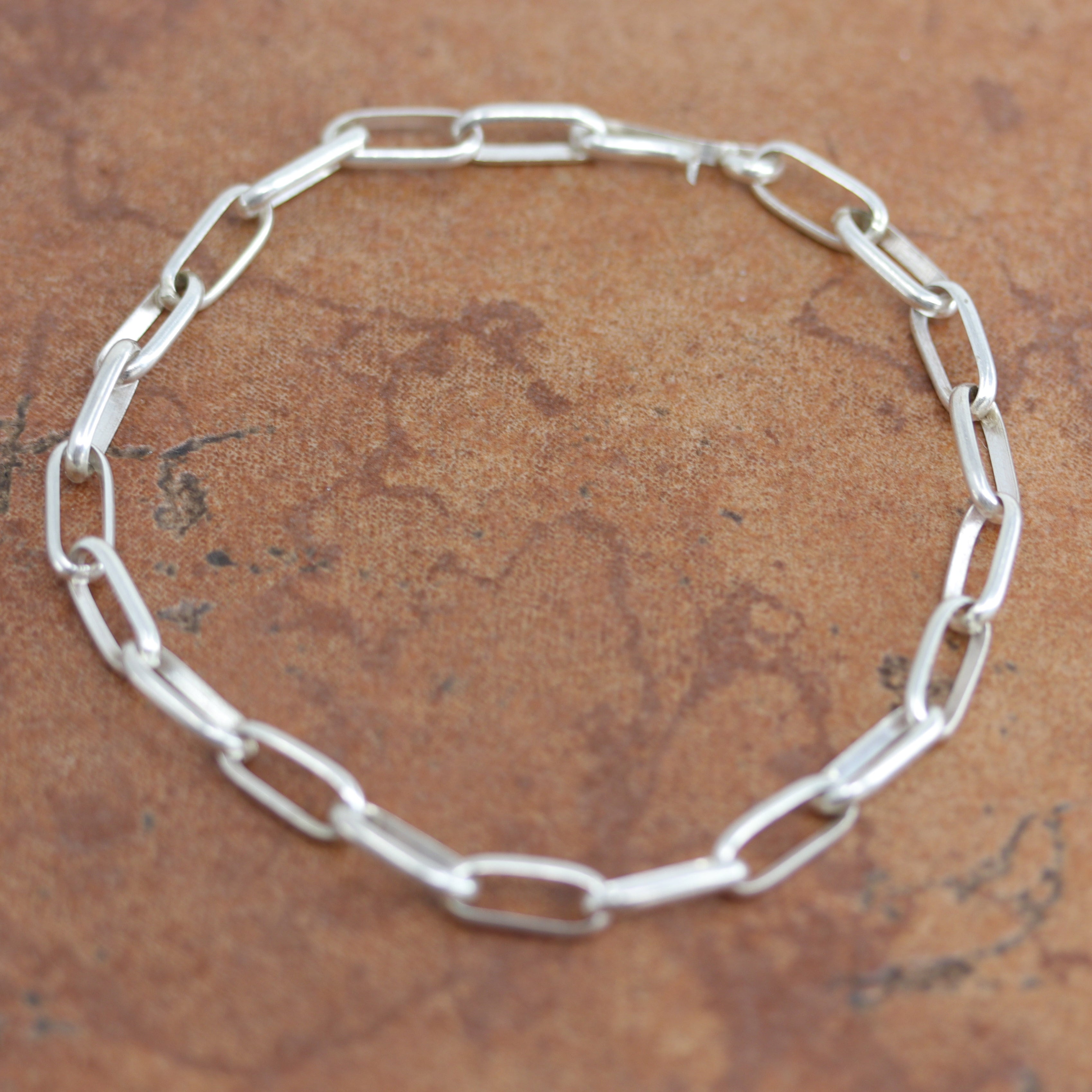 A very nice Native American link bracelet. It is made from sterling silver. It is about 8 1/4" in length and it is about 1/4" wide.