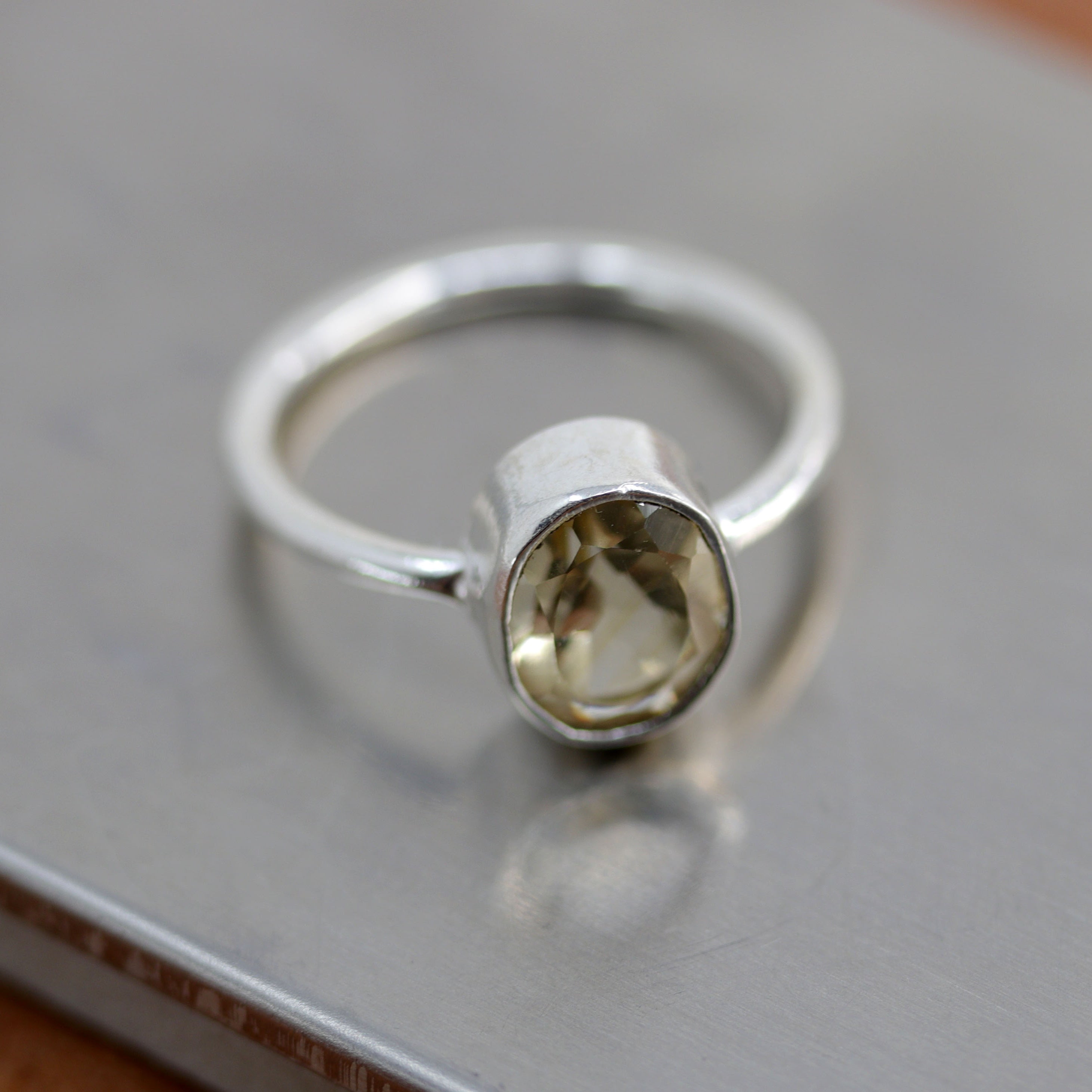 A beautiful Southwest Style gemstone ring made from sterling silver and citrine. The ring size is 4 1/2 and it is 7/16" in length.