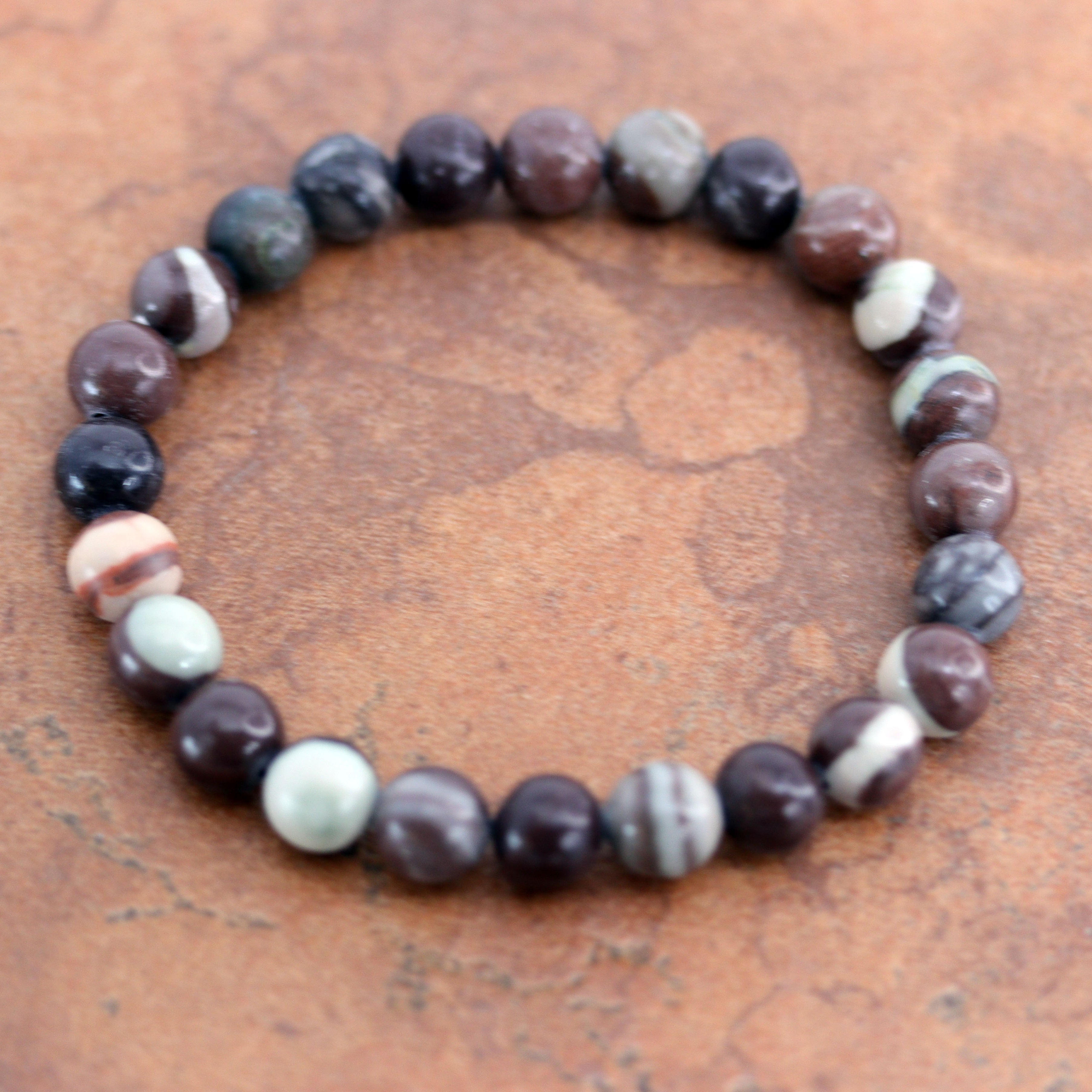 Beautiful bracelet that fits sizes 6" (more loose) to about 9" (tighter fit). The width of the bracelet is 8 mm.