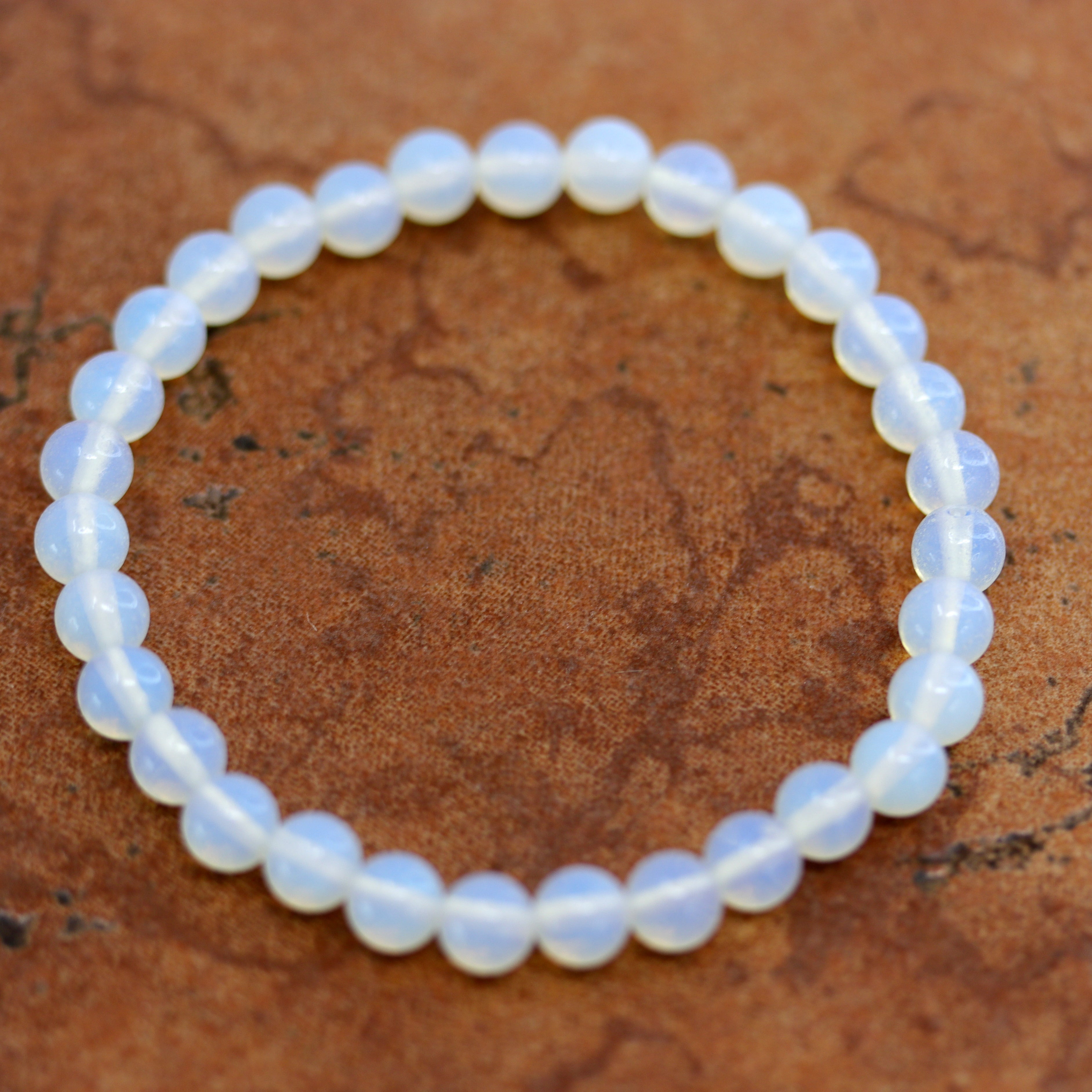 A beautiful opalite bubble bracelet. It fits sizes 6" (more loose) to about 9" (tighter fit). The width of the bracelet is 6 mm.