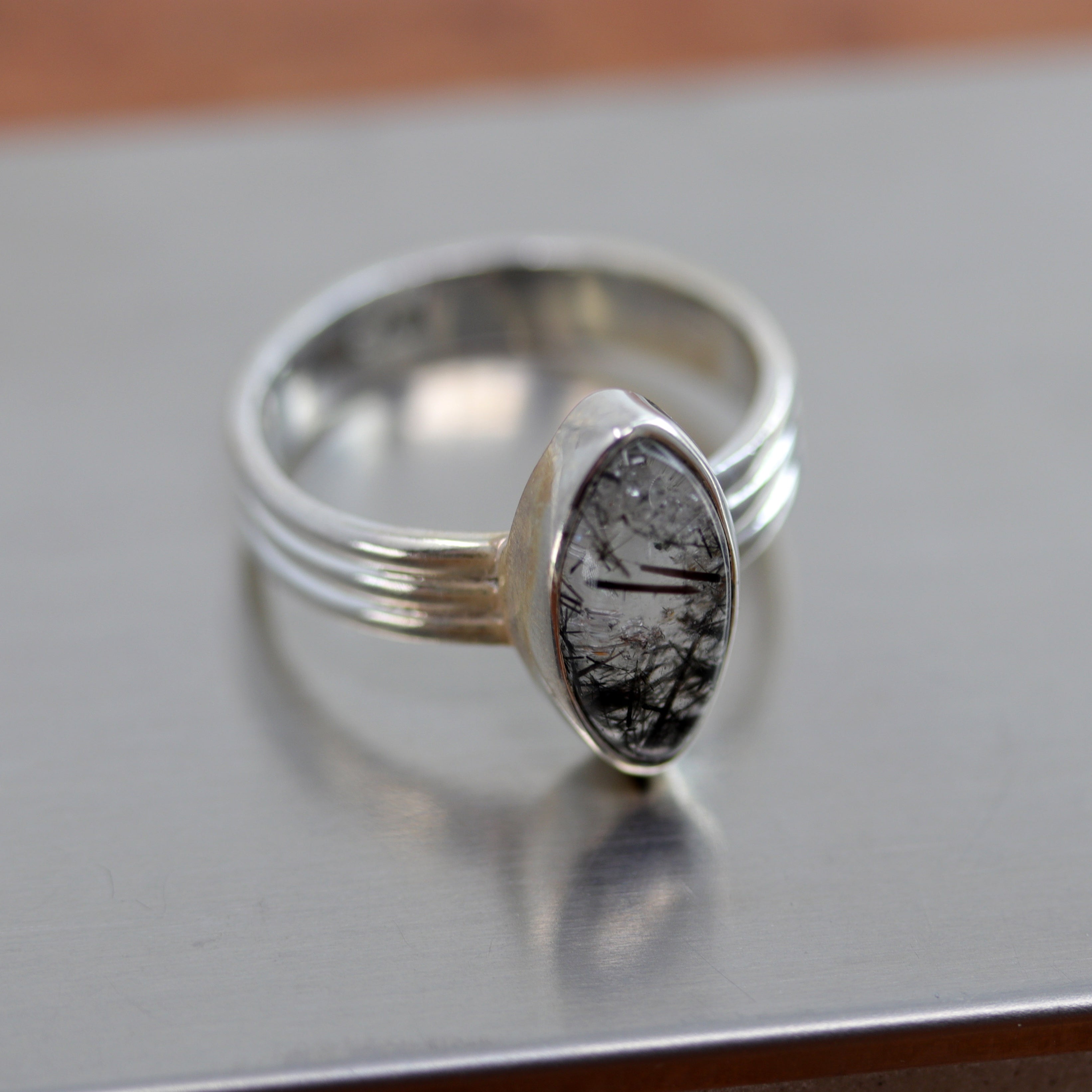 A beautiful Southwest Style gemstone ring made from sterling silver and herkimer diamond. The ring size is 7 1/2 and it is 5/8" in length.