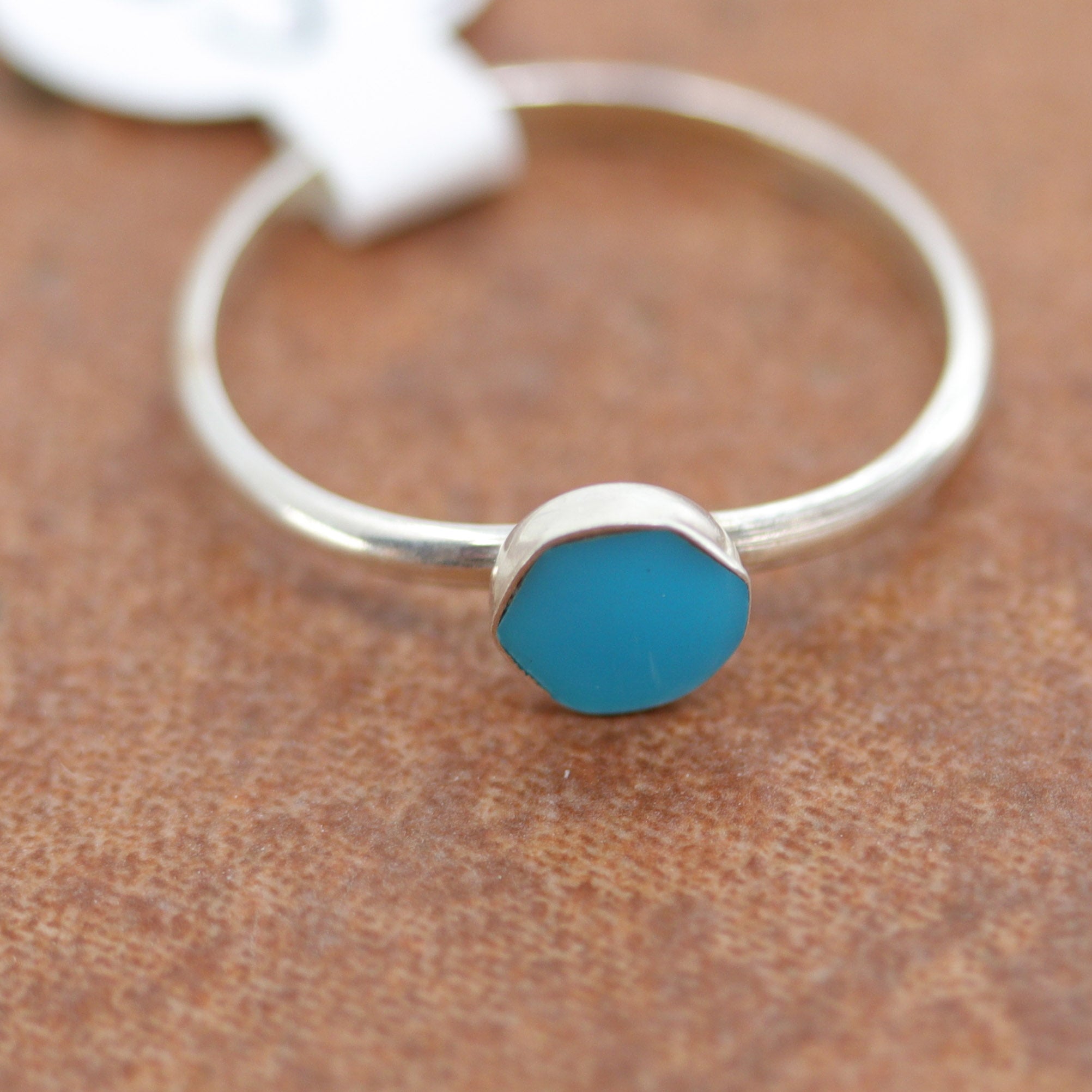 Zuni Native American ring with round stone. It is made from sterling silver and turquoise. The ring size 4 1/2 and it is 1/4" in length.