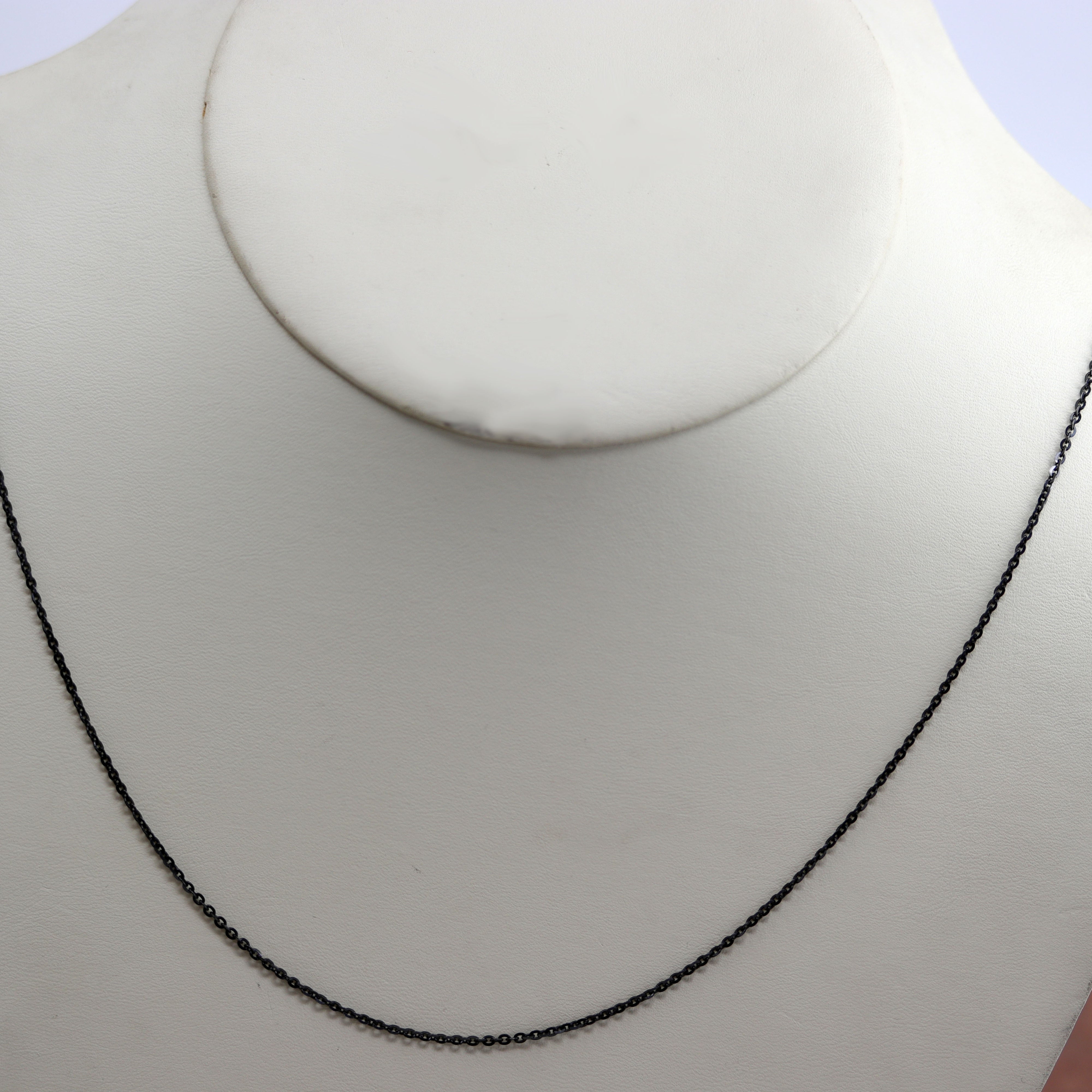A very nice sterling silver chain. It is made from .925 sterling silver. The chain is about 30". The black is oxidized sterling silver.