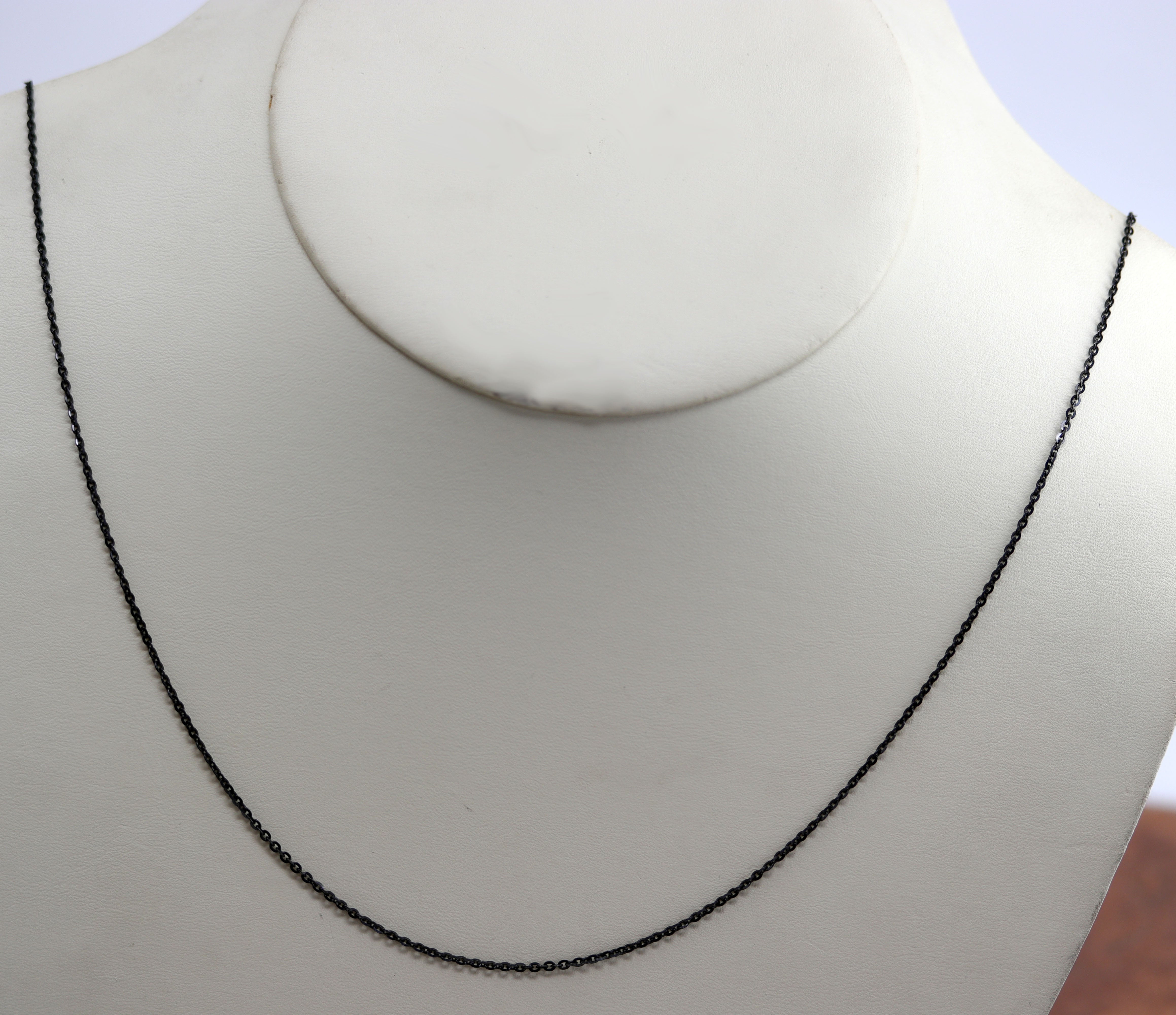 A very nice sterling silver chain. It is made from .925 sterling silver. The chain is about 30". The black is oxidized sterling silver.